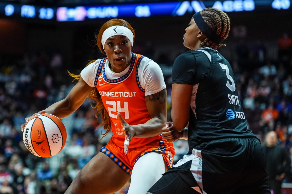 May 13, 2026; Uncasville, Connecticut, USA; Connecticut Sun forward Aneesah Morrow (24) drives the ball against Las Vegas Aces forward Nalyssa Smith (3) in the first half at Mohegan Sun Arena. Mandatory Credit: David Butler II-Imagn Images