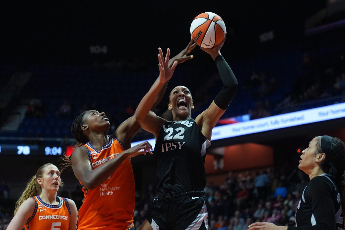 May 13, 2026; Uncasville, Connecticut, USA; Las Vegas Aces center A'ja Wilson (22) shoots the ball against Connecticut Sun forward Diamond Miller (1) in the second half at Mohegan Sun Arena. Mandatory Credit: David Butler II-Imagn Images