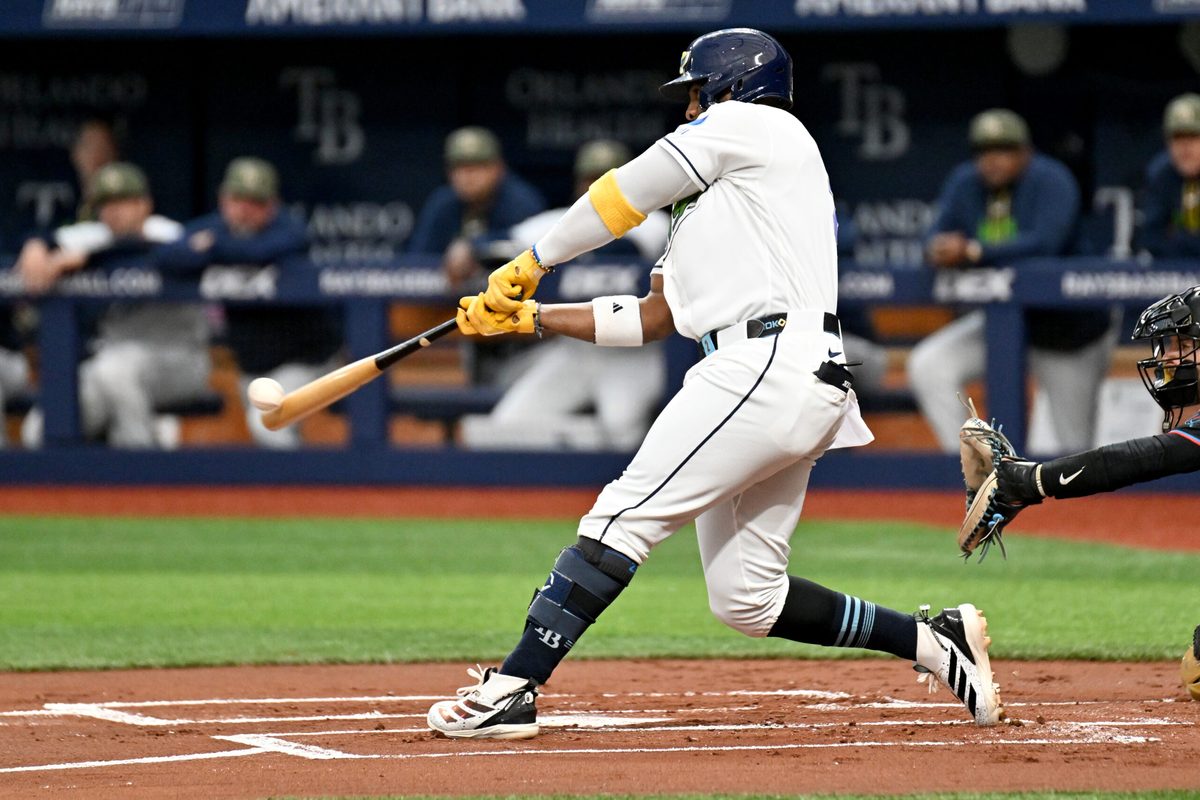 May 15, 2026; St. Petersburg, Florida, USA; Tampa Bay Rays designated hitter Yandy Diaz (2) hits a two run home run in the second inning against the Miami Marlins at Tropicana Field. Mandatory Credit: Jonathan Dyer-Imagn Images