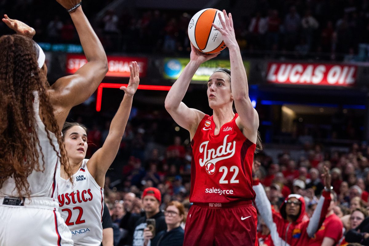 May 15, 2026; Indianapolis, Indiana, USA; Indiana Fever guard Caitlin Clark (22) shoots the ball while Washington Mystics guard Sonia Citron (22) defends in the second half at Gainbridge Fieldhouse. Mandatory Credit: Trevor Ruszkowski-Imagn Images