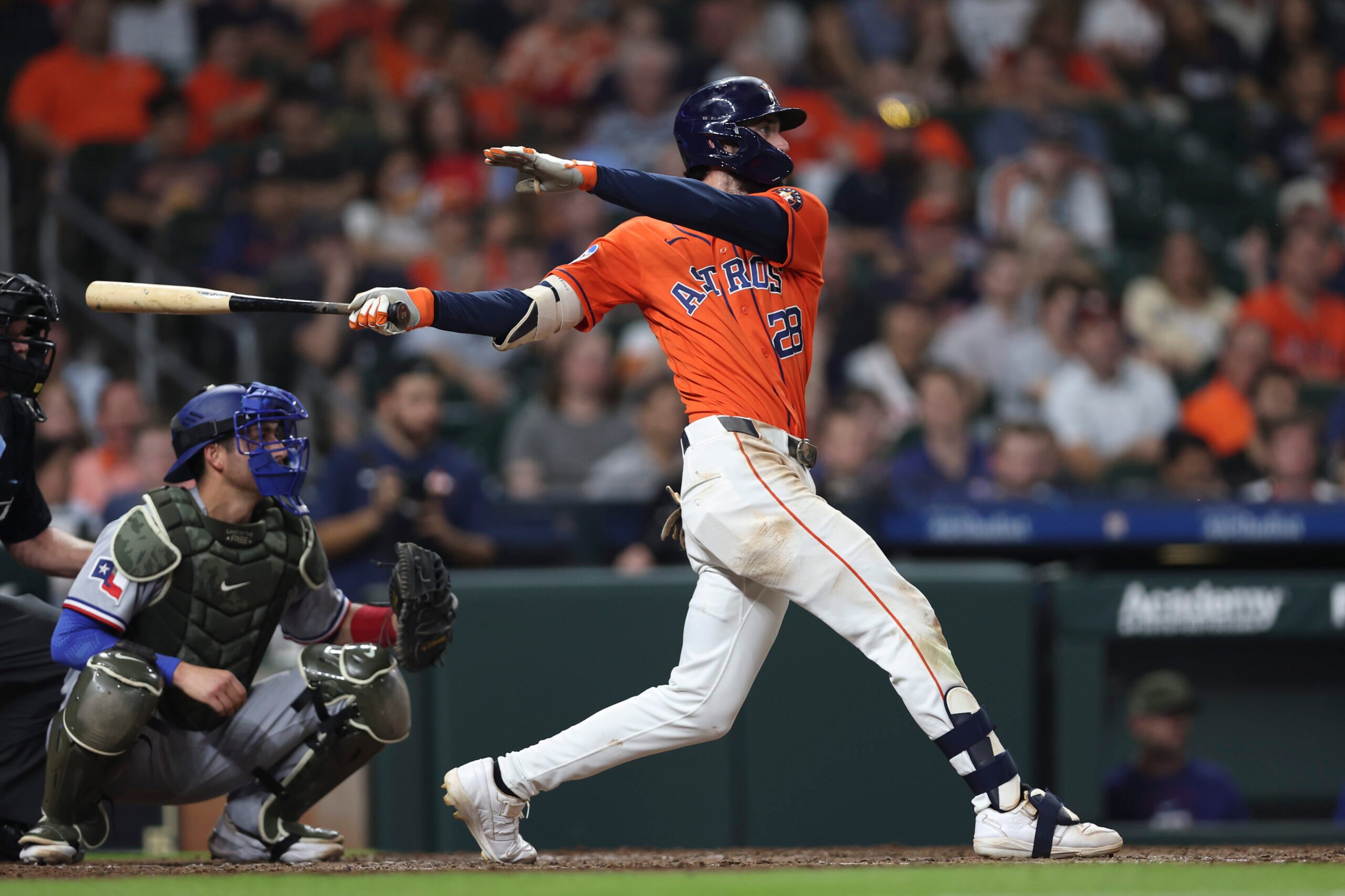 May 15, 2026; Houston, Texas, USA; Houston Astros shortstop Braden Shewmake (28) hits an RBI single during the eighth inning against the Texas Rangers at Daikin Park. Mandatory Credit: Troy Taormina-Imagn Images