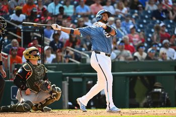 May 16, 2026; Washington, District of Columbia, USA; Washington Nationals catcher Keibert Ruiz (20) hits a three run home run against the Baltimore Orioles during the second inning at Nationals Park. Mandatory Credit: Brad Mills-Imagn Images