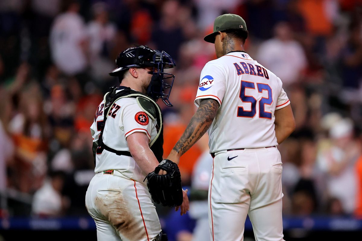 May 16, 2026; Houston, Texas, USA; Houston Astros pitcher Bryan Abreu (52) and catcher Christian Vasquez (2) congratulate each other after the final out against the Texas Rangers during the ninth inning at Daikin Park. Mandatory Credit: Erik Williams-Imagn Images