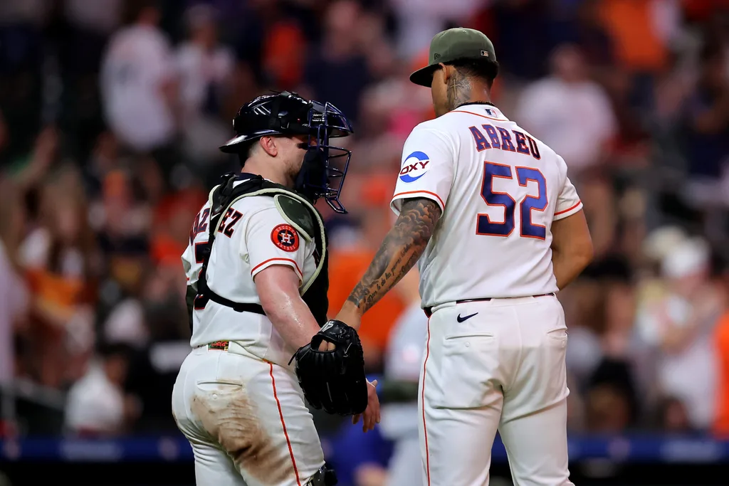 May 16, 2026; Houston, Texas, USA; Houston Astros pitcher Bryan Abreu (52) and catcher Christian Vasquez (2) congratulate each other after the final out against the Texas Rangers during the ninth inning at Daikin Park. Mandatory Credit: Erik Williams-Imagn Images