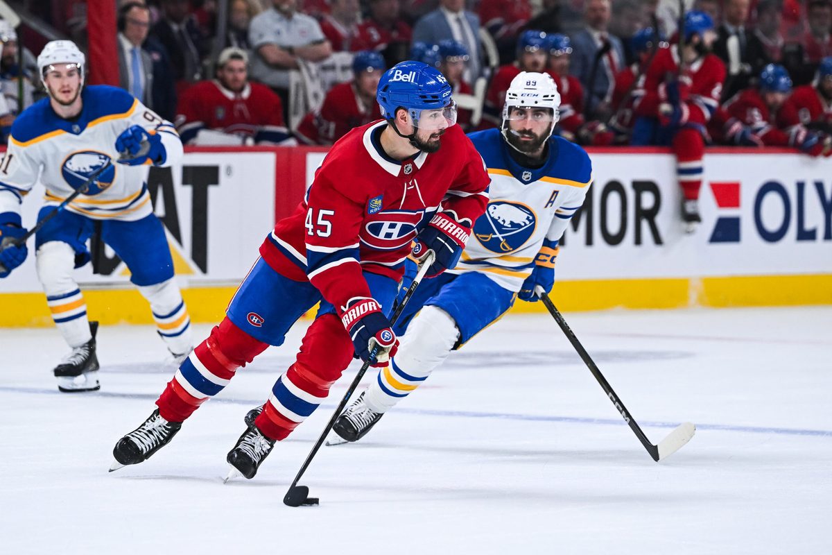May 16, 2026; Montreal, Quebec, CAN; Montreal Canadiens defenseman Alexandre Carrier (45) plays the puck against Buffalo Sabres right wing Alex Tuch (89) during the second period in game six of the second round of the 2026 Stanley Cup Playoffs at Bell Centre. Mandatory Credit: David Kirouac-Imagn Images
