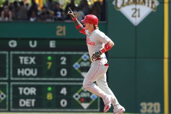 May 17, 2026; Pittsburgh, Pennsylvania, USA; Philadelphia Phillies second baseman Bryson Stott (5) gestures as he circles the bases on a solo home run against the Pittsburgh Pirates during the eighth inning at PNC Park. Mandatory Credit: Charles LeClaire-Imagn Images