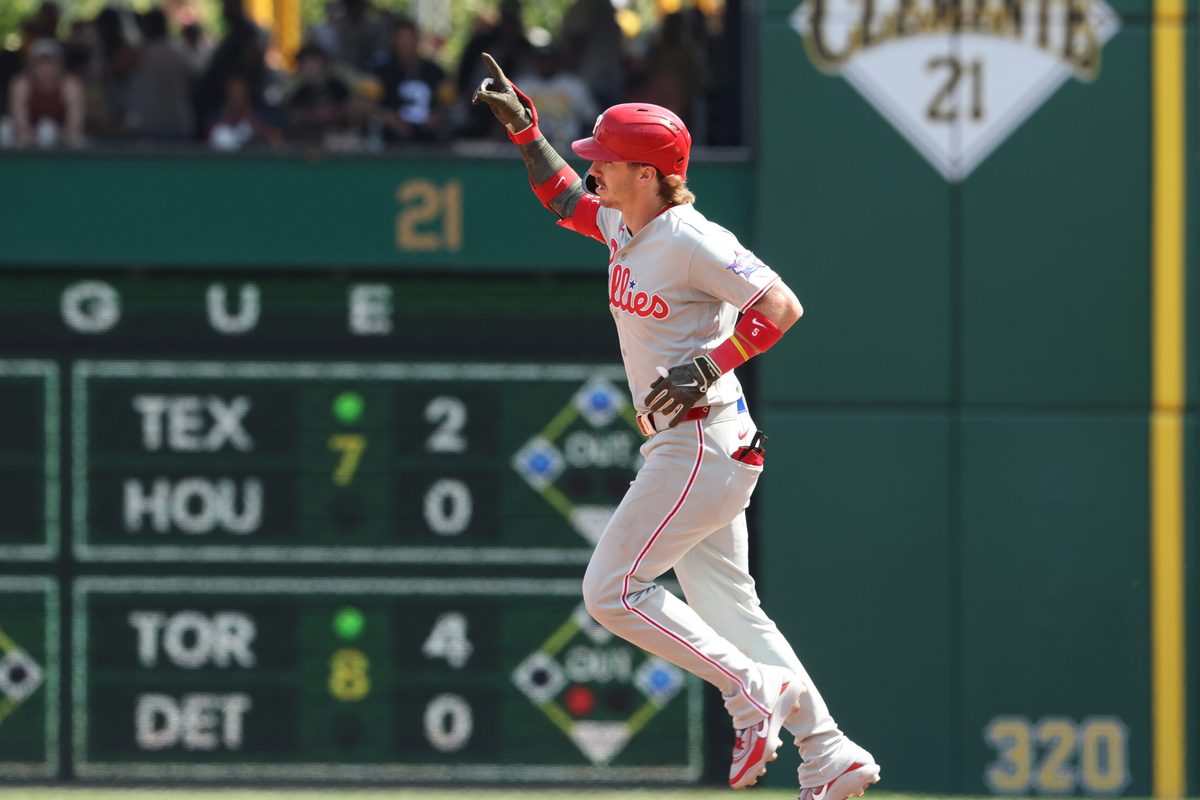 May 17, 2026; Pittsburgh, Pennsylvania, USA; Philadelphia Phillies second baseman Bryson Stott (5) gestures as he circles the bases on a solo home run against the Pittsburgh Pirates during the eighth inning at PNC Park. Mandatory Credit: Charles LeClaire-Imagn Images