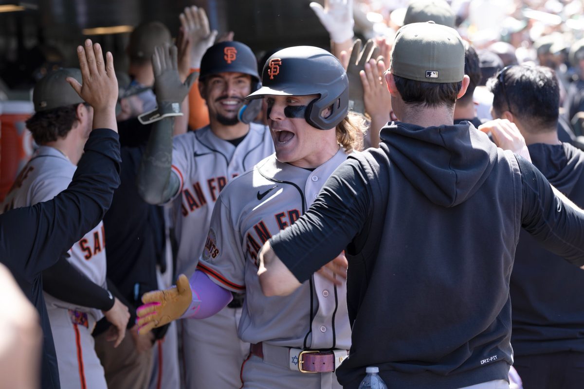 May 17, 2026; West Sacramento, California, USA; San Francisco Giants center fielder Harrison Bader (right, facing) celebrates his grand slam during the eighth inning against the Athletics at Sutter Health Park. Mandatory Credit: D. Ross Cameron-Imagn Images
