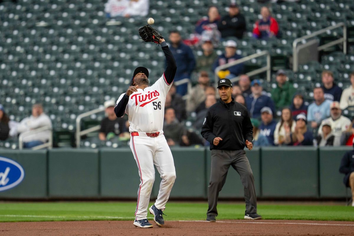May 19, 2026; Minneapolis, Minnesota, USA; Minnesota Twins first baseman Josh Bell (56) catches a fly ball against the Houston Astros in the first inning at Target Field. Mandatory Credit: Jesse Johnson-Imagn Images