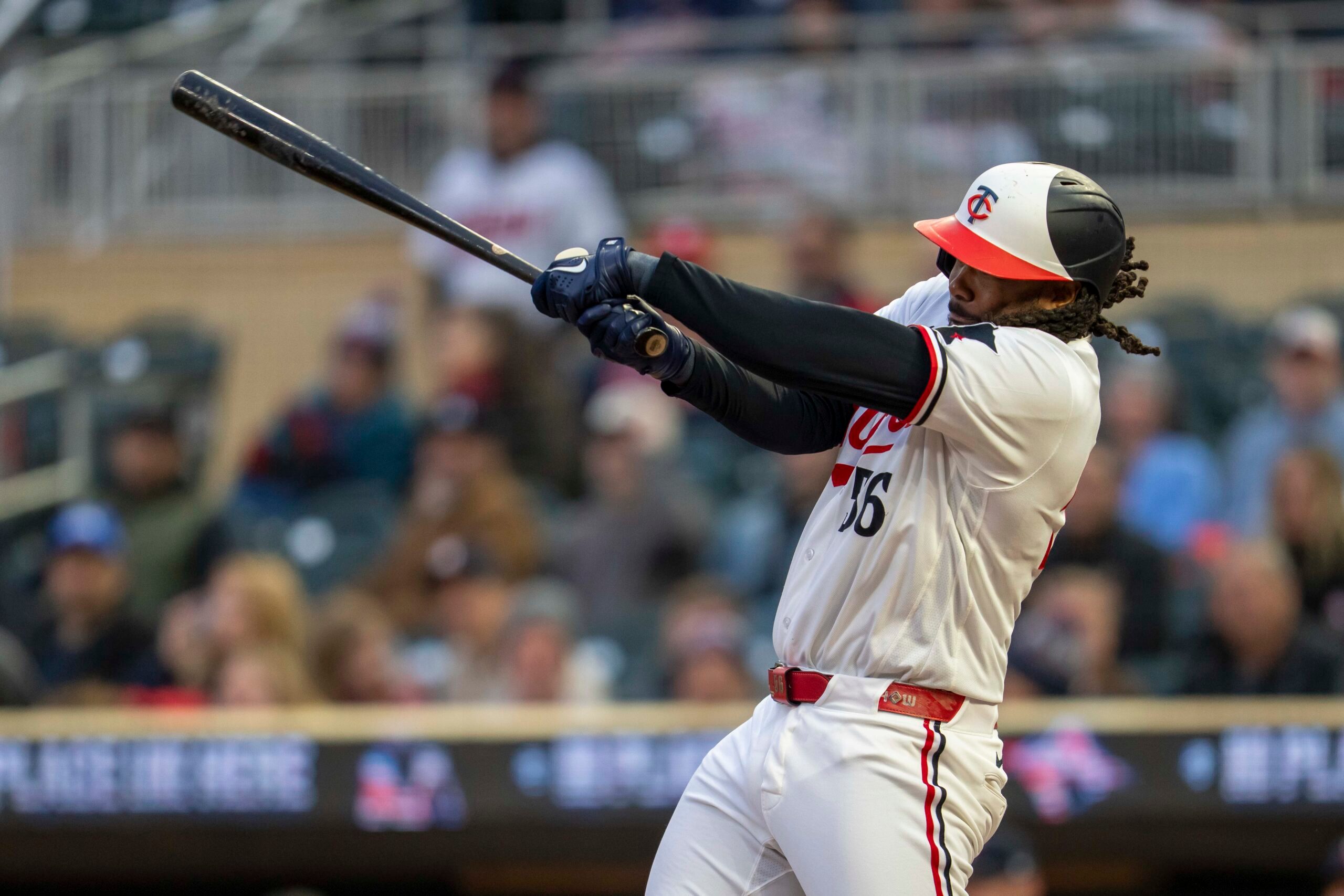May 19, 2026; Minneapolis, Minnesota, USA; Minnesota Twins first baseman Josh Bell (56) hits a single against the Houston Astros in the sixth inning at Target Field. Mandatory Credit: Jesse Johnson-Imagn Images