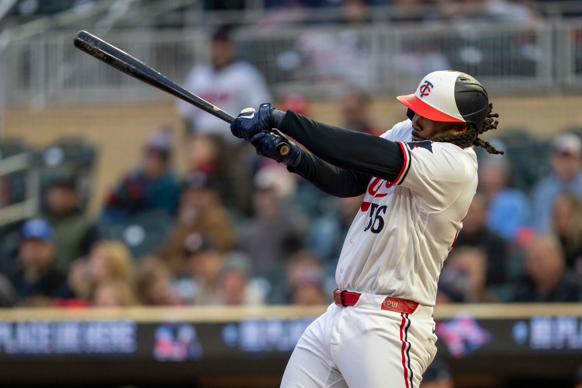 May 19, 2026; Minneapolis, Minnesota, USA; Minnesota Twins first baseman Josh Bell (56) hits a single against the Houston Astros in the sixth inning at Target Field. Mandatory Credit: Jesse Johnson-Imagn Images