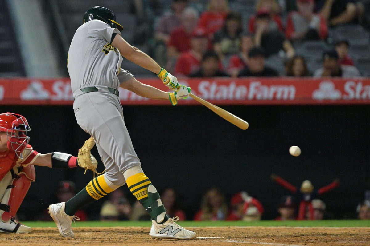 May 19, 2026; Anaheim, California, USA;  Athletics first baseman Nick Kurtz (16) singles in two runs in the sixth inning against the Los Angeles Angels at Angel Stadium. Mandatory Credit: Jayne Kamin-Oncea-Imagn Images
