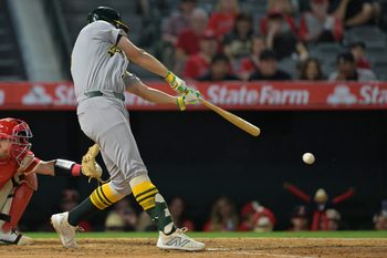 May 19, 2026; Anaheim, California, USA;  Athletics first baseman Nick Kurtz (16) singles in two runs in the sixth inning against the Los Angeles Angels at Angel Stadium. Mandatory Credit: Jayne Kamin-Oncea-Imagn Images