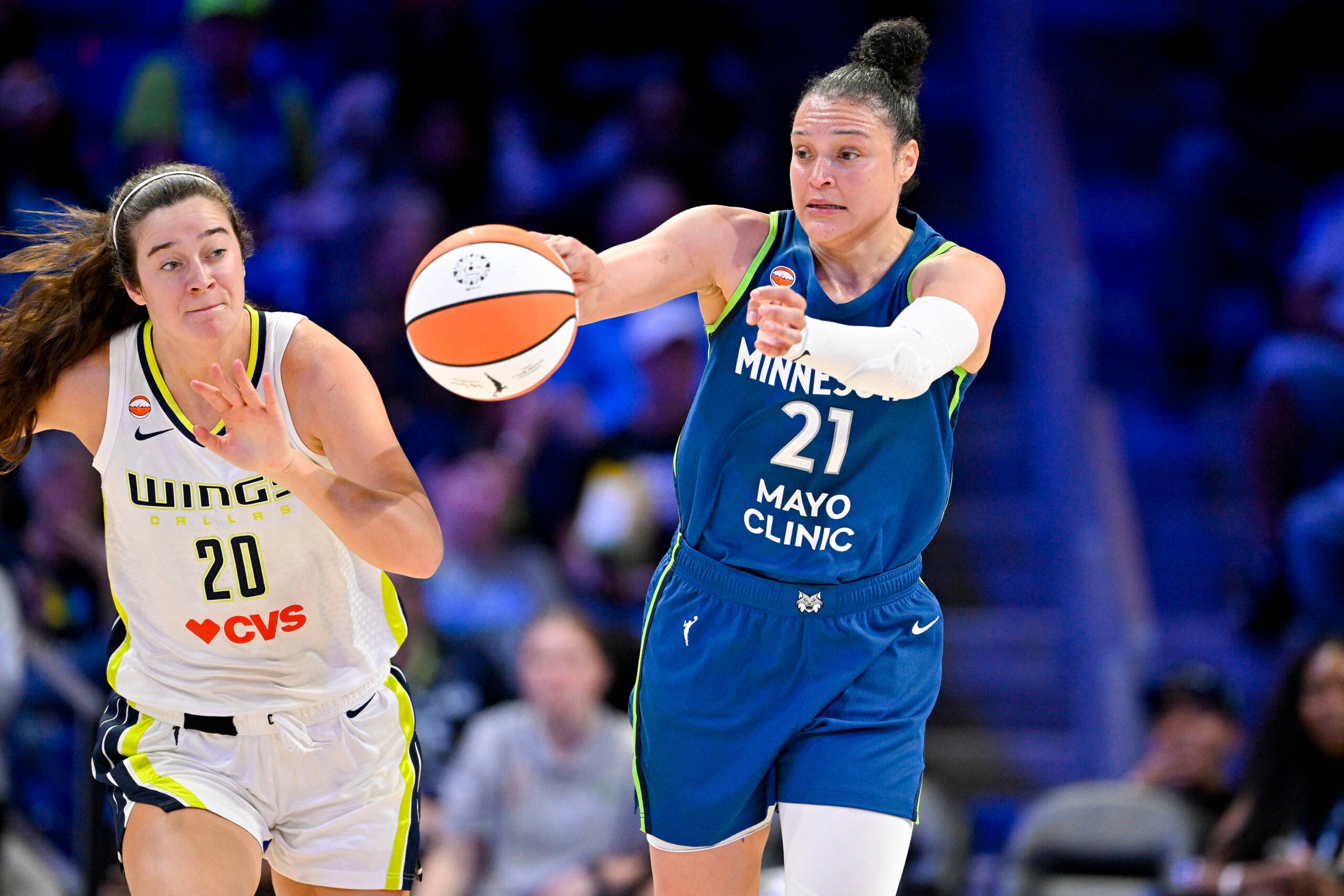 May 14, 2026; Arlington, Texas, USA; Minnesota Lynx guard Kayla McBride (21) passes the ball during the game between the Wings and the Lynx at College Park Center. Mandatory Credit: Jerome Miron-Imagn Images