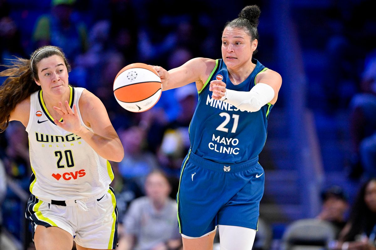May 14, 2026; Arlington, Texas, USA; Minnesota Lynx guard Kayla McBride (21) passes the ball during the game between the Wings and the Lynx at College Park Center. Mandatory Credit: Jerome Miron-Imagn Images
