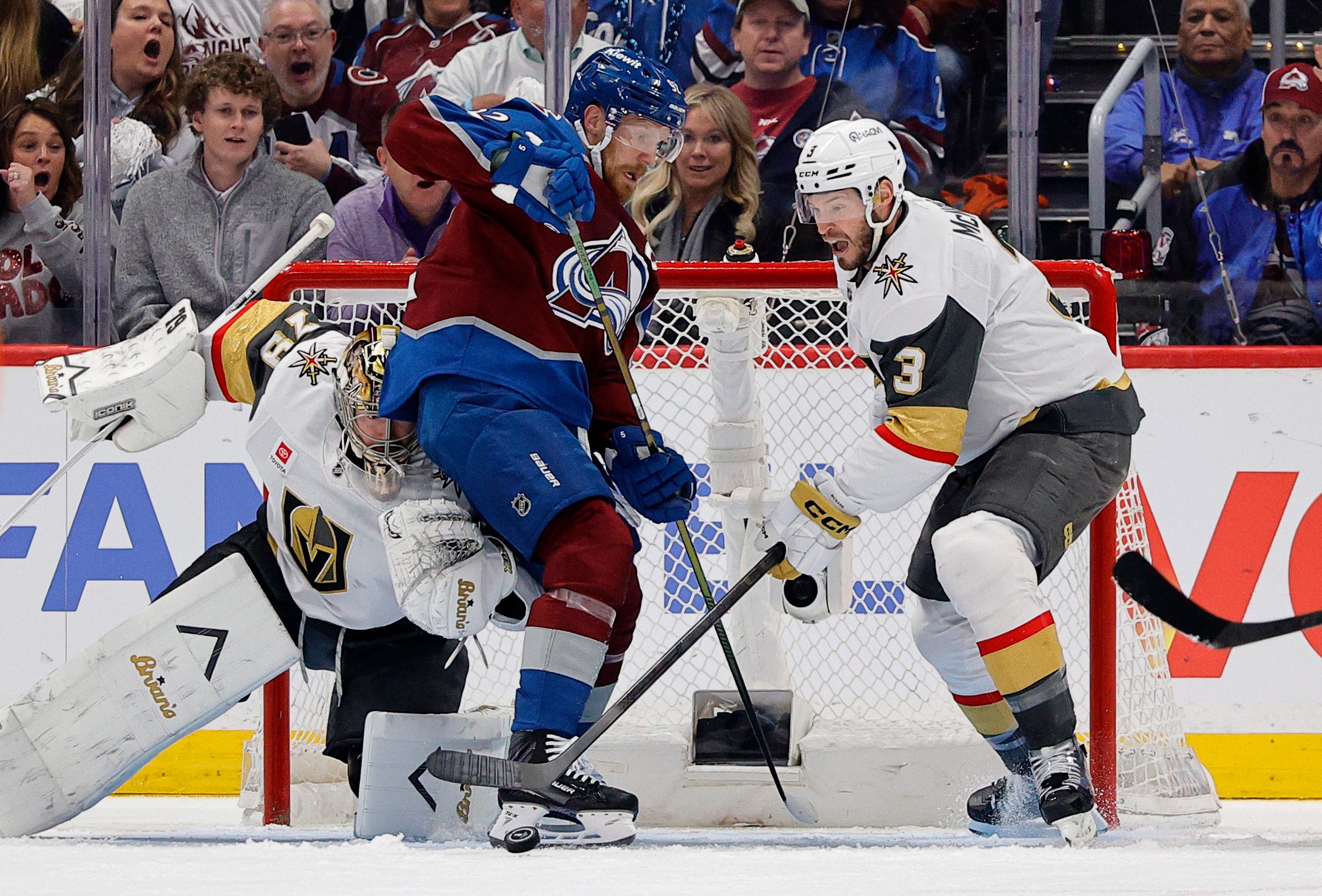 May 20, 2026; Denver, Colorado, USA; Vegas Golden Knights goaltender Carter Hart (79) and defenseman Brayden McNabb (3) defend Colorado Avalanche left wing Gabriel Landeskog (92) during the first period in game one of the Western Conference Final of the 2026 Stanley Cup Playoffs at Ball Arena. Mandatory Credit: Isaiah J. Downing-Imagn Images