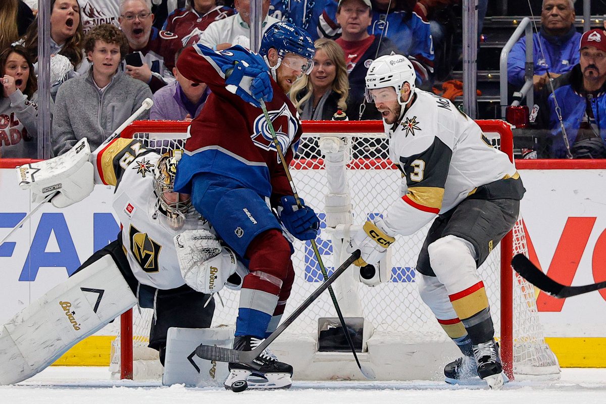 May 20, 2026; Denver, Colorado, USA; Vegas Golden Knights goaltender Carter Hart (79) and defenseman Brayden McNabb (3) defend Colorado Avalanche left wing Gabriel Landeskog (92) during the first period in game one of the Western Conference Final of the 2026 Stanley Cup Playoffs at Ball Arena. Mandatory Credit: Isaiah J. Downing-Imagn Images
