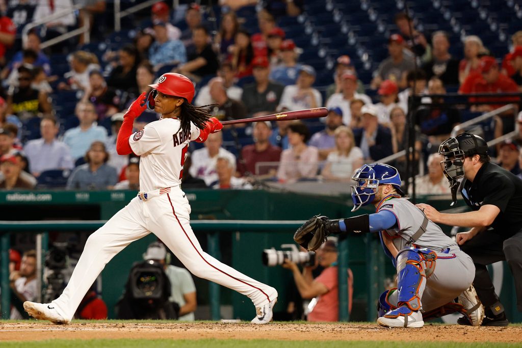 May 20, 2026; Washington, District of Columbia, USA; Washington Nationals shortstop CJ Abrams (5) singles against the New York Mets during the sixth inning at Nationals Park. Mandatory Credit: Geoff Burke-Imagn Images