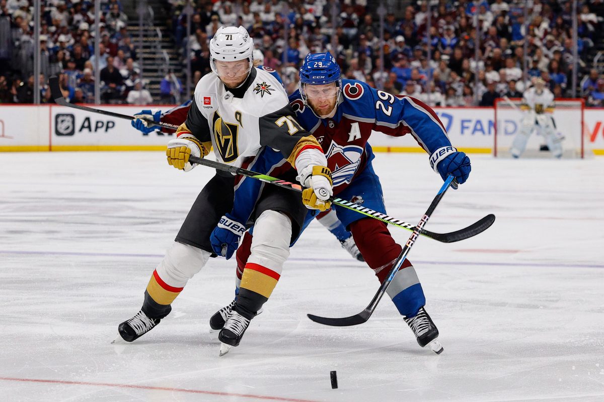 May 20, 2026; Denver, Colorado, USA; Vegas Golden Knights center William Karlsson (71) and Colorado Avalanche center Nathan MacKinnon (29) battle for the puck during the third period in game one of the Western Conference Final of the 2026 Stanley Cup Playoffs at Ball Arena. Mandatory Credit: Isaiah J. Downing-Imagn Images