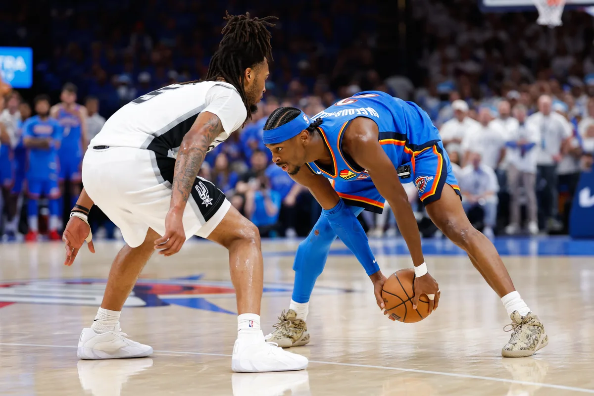 May 20, 2026; Oklahoma City, Oklahoma, USA; Oklahoma City Thunder guard Shai Gilgeous-Alexander (2) looks to pass as San Antonio Spurs guard Stephon Castle (5) defends during the fourth quarter during game two of the western conference finals for the 2026 NBA playoffs at Paycom Center. Mandatory Credit: Alonzo Adams-Imagn Images