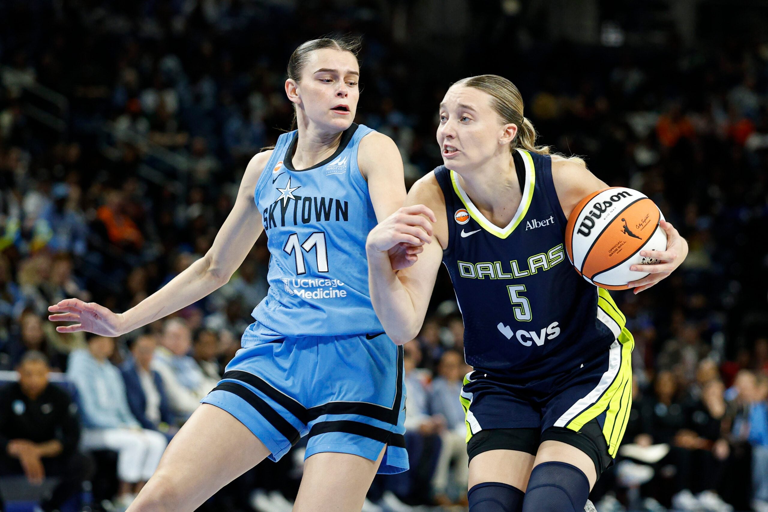 May 20, 2026; Chicago, Illinois, USA; Dallas Wings guard Paige Bueckers (5) drives to the basket against Chicago Sky guard Gabriela Jaquez (11) during the second half at Wintrust Arena. Mandatory Credit: Kamil Krzaczynski-Imagn Images