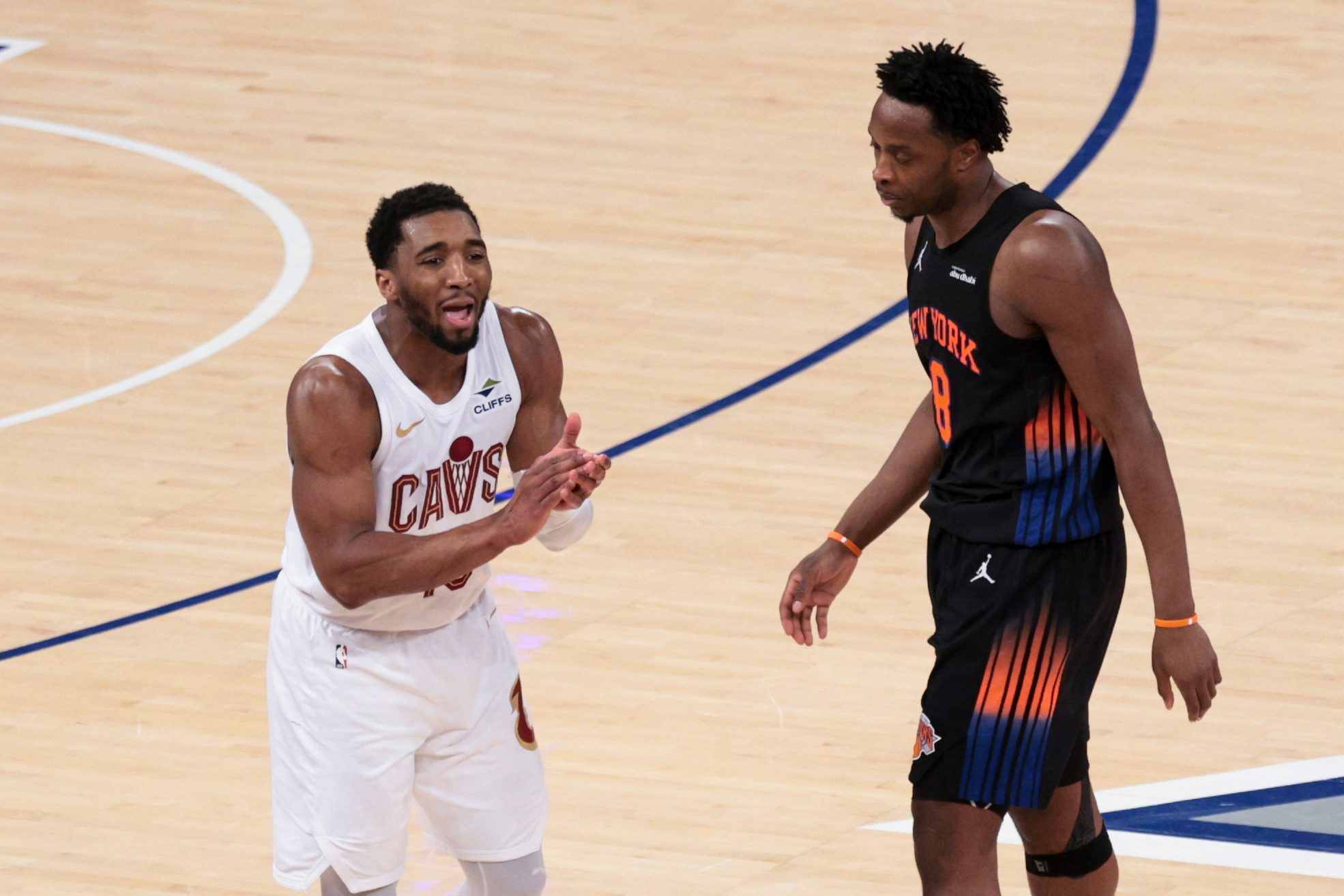 May 21, 2026; New York, New York, USA; Cleveland Cavaliers guard Donovan Mitchell (45) reacts after being called for a foul as New York Knicks forward Og Anunoby (8) looks on during the fourth quarter of game two of the eastern conference finals of the 2026 NBA playoffs at Madison Square Garden. Mandatory Credit: Vincent Carchietta-Imagn Images