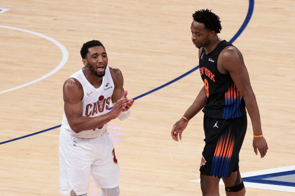 May 21, 2026; New York, New York, USA; Cleveland Cavaliers guard Donovan Mitchell (45) reacts after being called for a foul as New York Knicks forward Og Anunoby (8) looks on during the fourth quarter of game two of the eastern conference finals of the 2026 NBA playoffs at Madison Square Garden. Mandatory Credit: Vincent Carchietta-Imagn Images