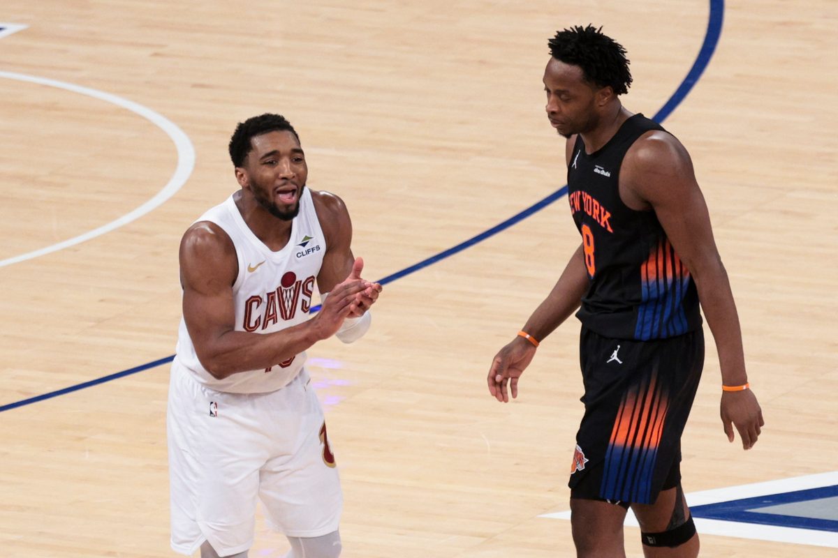 May 21, 2026; New York, New York, USA; Cleveland Cavaliers guard Donovan Mitchell (45) reacts after being called for a foul as New York Knicks forward Og Anunoby (8) looks on during the fourth quarter of game two of the eastern conference finals of the 2026 NBA playoffs at Madison Square Garden. Mandatory Credit: Vincent Carchietta-Imagn Images