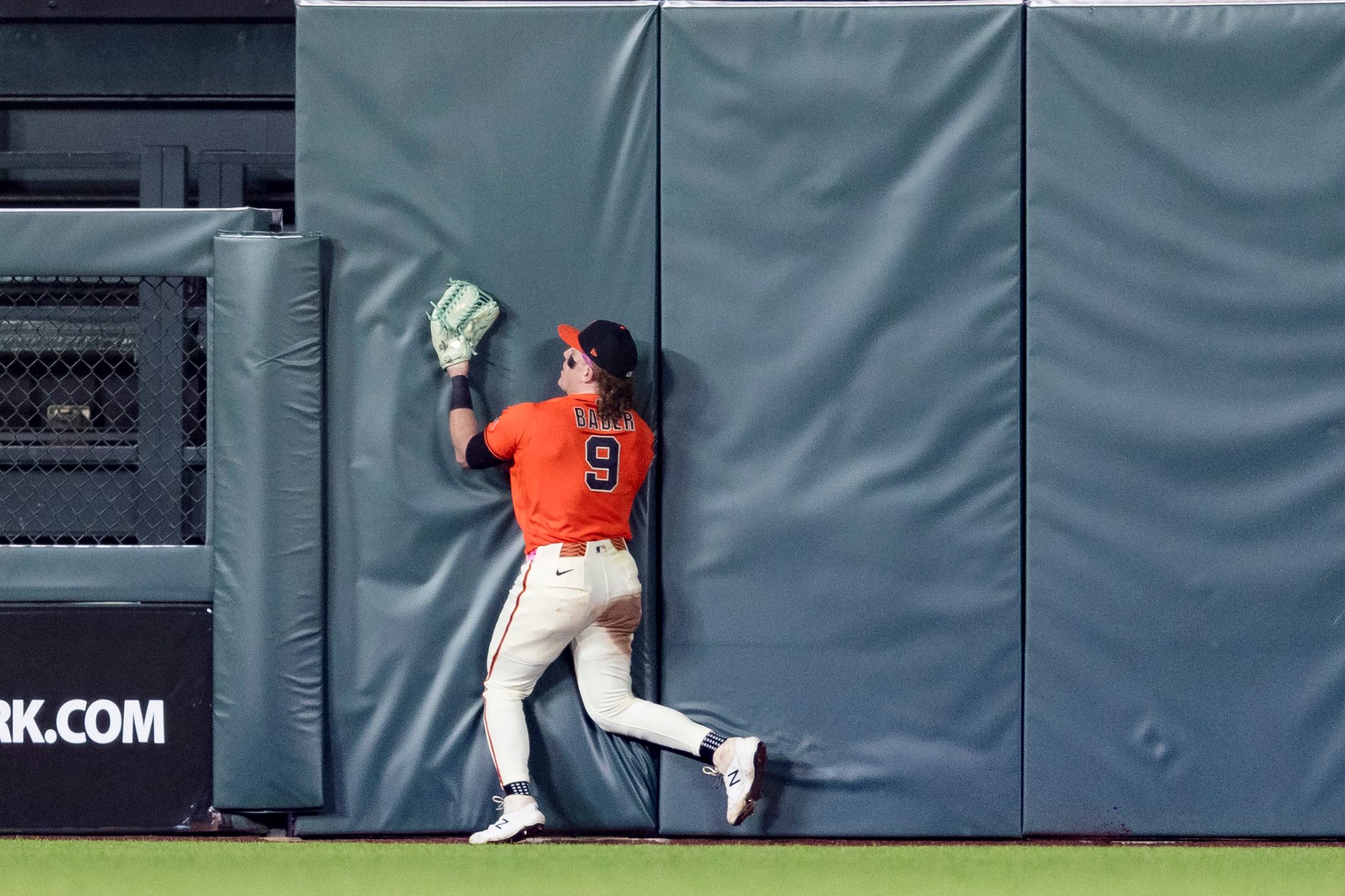 May 22, 2026; San Francisco, California, USA; San Francisco Giants center fielder Harrison Bader (9) hits the wall after catching a deep fly ball against the Chicago White Sox  during the ninth inning at Oracle Park. Mandatory Credit: John Hefti-Imagn Images