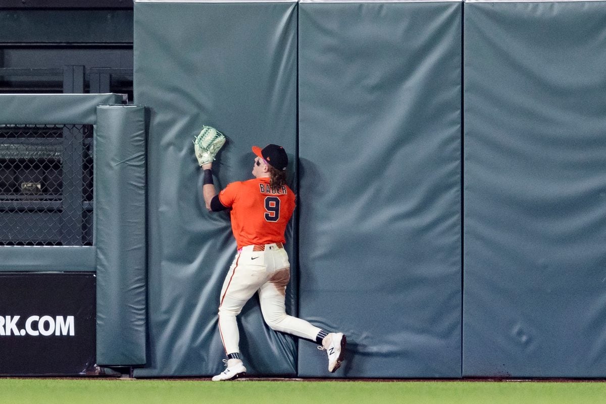 May 22, 2026; San Francisco, California, USA; San Francisco Giants center fielder Harrison Bader (9) hits the wall after catching a deep fly ball against the Chicago White Sox during the ninth inning at Oracle Park. Mandatory Credit: John Hefti-Imagn Images
