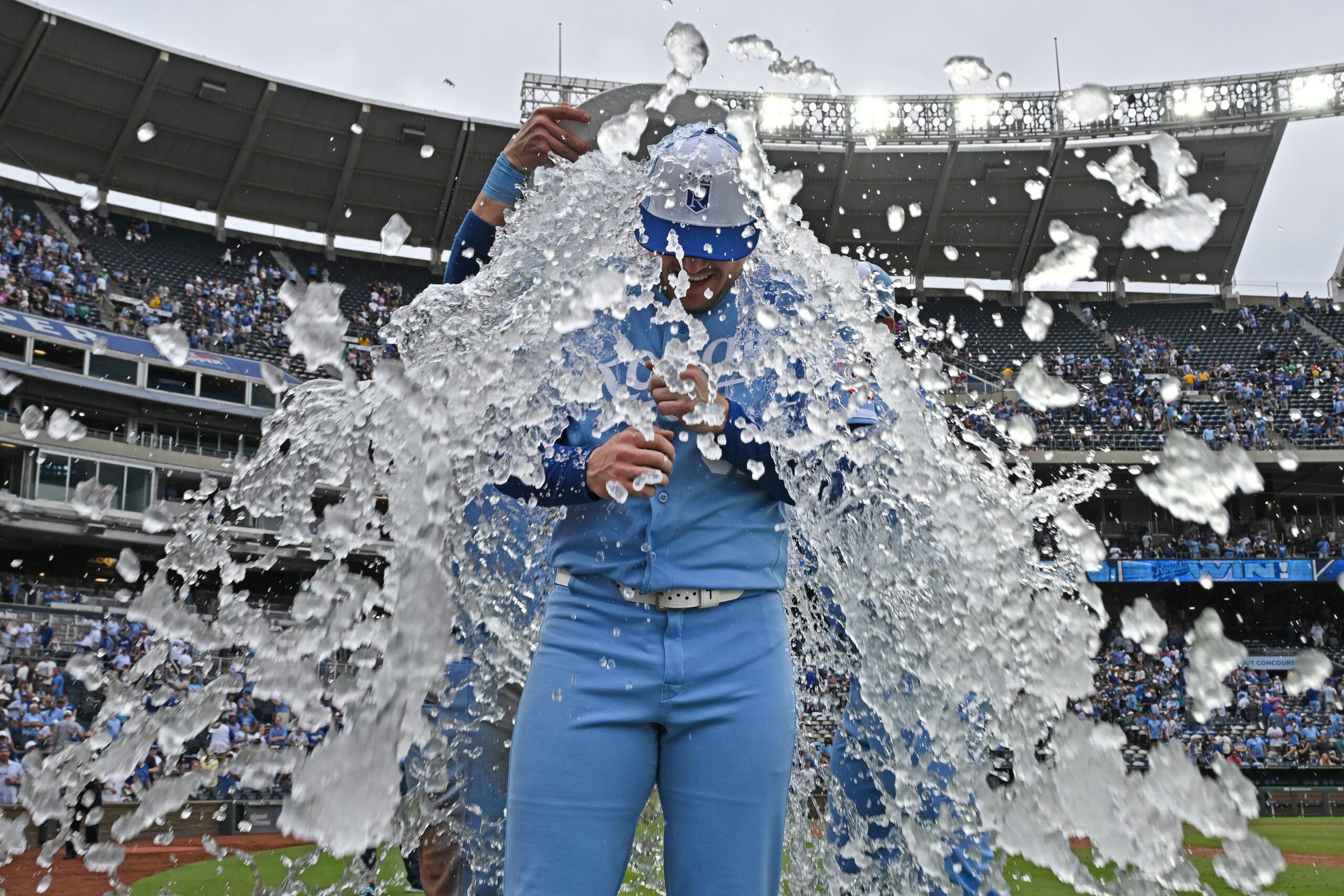 May 23, 2026; Kansas City, Missouri, USA;  Kansas City Royals starting pitcher Stephen Kolek (32) gets dunked with ice water after throwing a complete game shutout to beat the Seattle Mariners at Kauffman Stadium. Mandatory Credit: Peter Aiken-Imagn Images