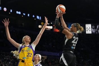 May 23, 2026; Las Vegas, Nevada, USA;  Las Vegas Aces center A'ja Wilson (22) shoots against Los Angeles Sparks forward Cameron Brink (22) in the first quarter of their game at Michelob Ultra Arena. Mandatory Credit: Candice Ward-Imagn Images