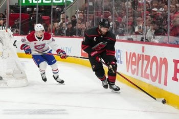 May 23, 2026; Raleigh, North Carolina, USA; Carolina Hurricanes center Jordan Staal (11) skates with the puck during the third period against the Montréal Canadiens in game two of the Eastern Conferene Final of the 2026 Stanley Cup Playoffs at Lenovo Center. Mandatory Credit: James Guillory-Imagn Images