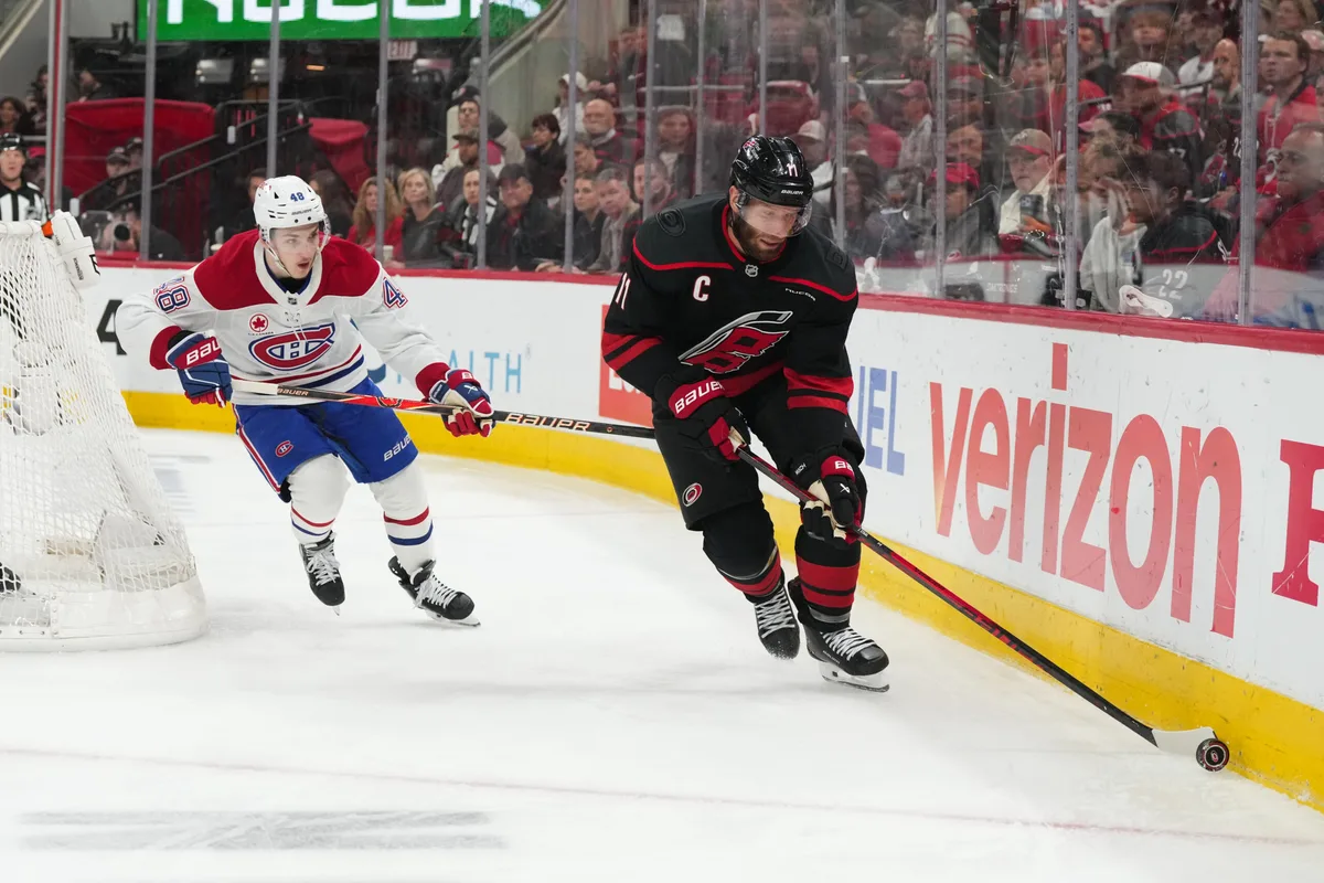 May 23, 2026; Raleigh, North Carolina, USA; Carolina Hurricanes center Jordan Staal (11) skates with the puck during the third period against the Montréal Canadiens in game two of the Eastern Conferene Final of the 2026 Stanley Cup Playoffs at Lenovo Center. Mandatory Credit: James Guillory-Imagn Images