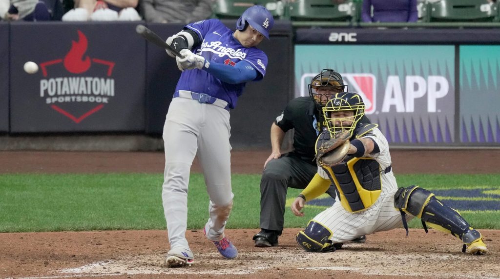 Los Angeles Dodgers two-way player Shohei Ohtani (17) hits an RBI single during the ninth inning of their game against the Milwaukee Brewers Saturday, May 23, 2026 at American Family Field in Milwaukee, Wisconsin.