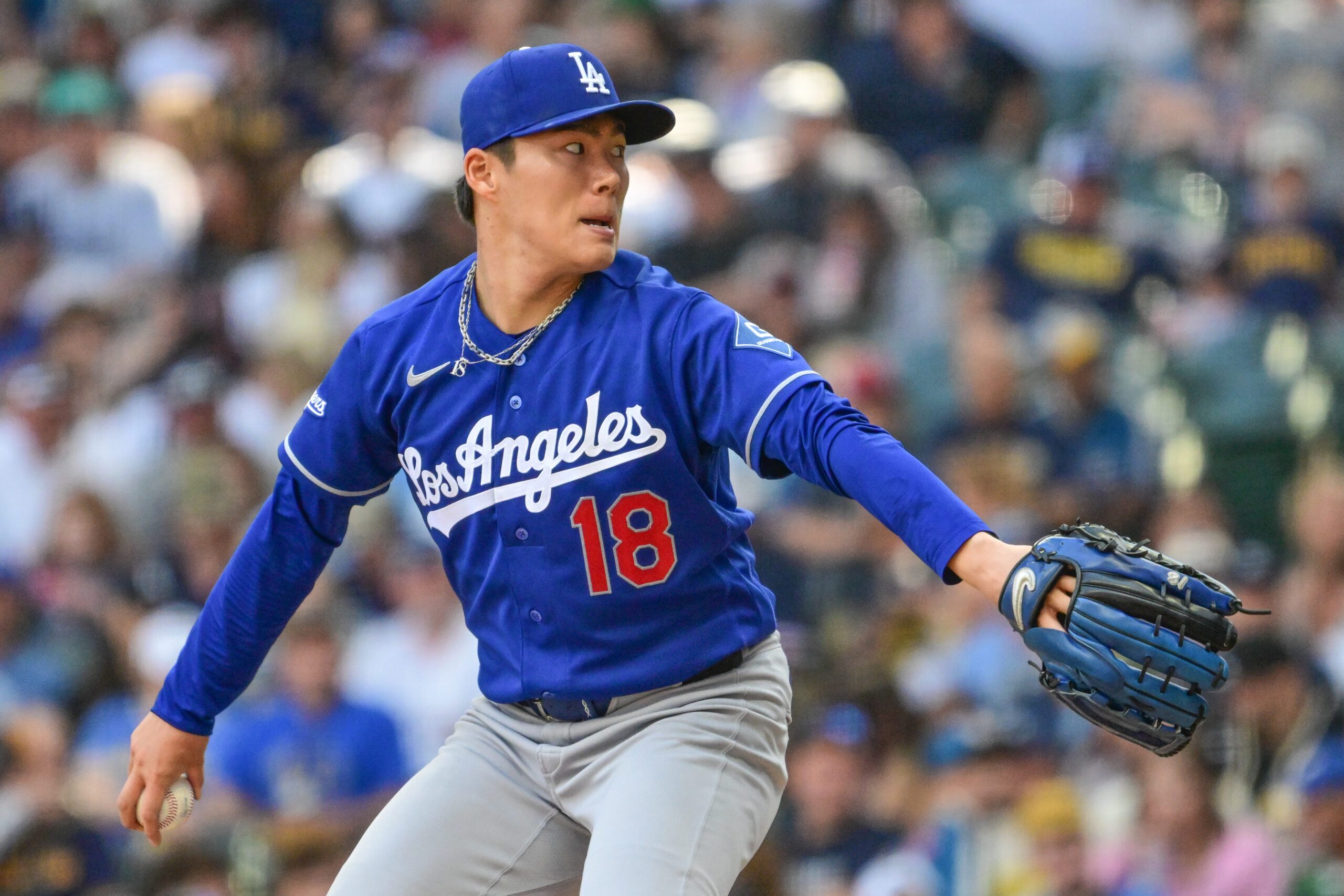May 24, 2026; Milwaukee, Wisconsin, USA;  Los Angeles Dodgers starting pitcher Yoshinobu Yamamoto (18) throws a pitch in the sixth inning against the Milwaukee Brewers at American Family Field. Mandatory Credit: Benny Sieu-Imagn Images