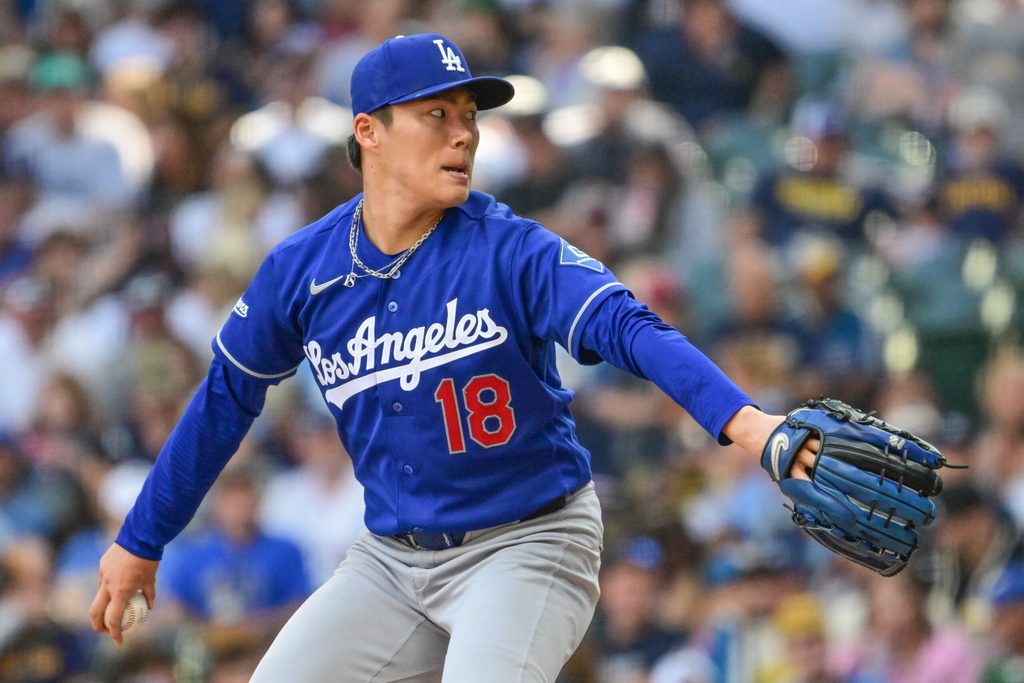 May 24, 2026; Milwaukee, Wisconsin, USA; Los Angeles Dodgers starting pitcher Yoshinobu Yamamoto (18) throws a pitch in the sixth inning against the Milwaukee Brewers at American Family Field. Mandatory Credit: Benny Sieu-Imagn Images