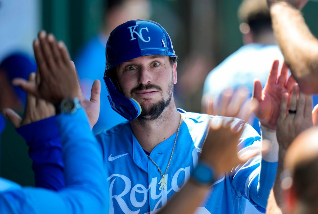May 24, 2026; Kansas City, Missouri, USA; Kansas City Royals first baseman Vinnie Pasquantino (9) is congratulated by teammates after scoring a run during the seventh inning against the Seattle Mariners at Kauffman Stadium. Mandatory Credit: Jay Biggerstaff-Imagn Images