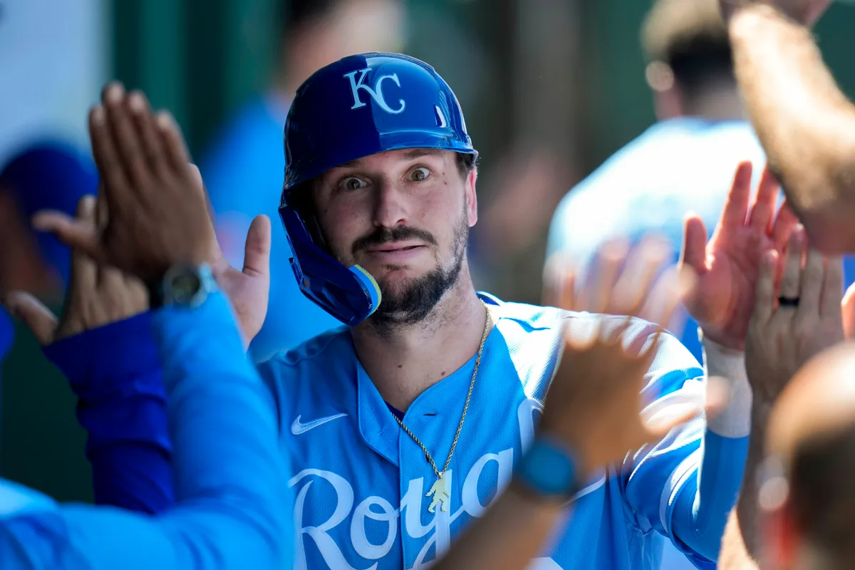 May 24, 2026; Kansas City, Missouri, USA; Kansas City Royals first baseman Vinnie Pasquantino (9) is congratulated by teammates after scoring a run during the seventh inning against the Seattle Mariners at Kauffman Stadium. Mandatory Credit: Jay Biggerstaff-Imagn Images