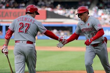 May 25, 2026; New York City, New York, USA; Cincinnati Reds left fielder JJ Bleday (22) celebrates his solo home run against the New York Mets with third baseman Sal Stewart (27) during the third inning at Citi Field. Mandatory Credit: Brad Penner-Imagn Images