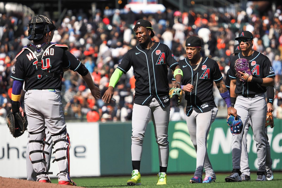May 25, 2026; San Francisco, California, USA; Arizona Diamondbacks players high five after the game against the San Francisco Giants at Oracle Park. Mandatory Credit: Kelley L Cox-Imagn Images