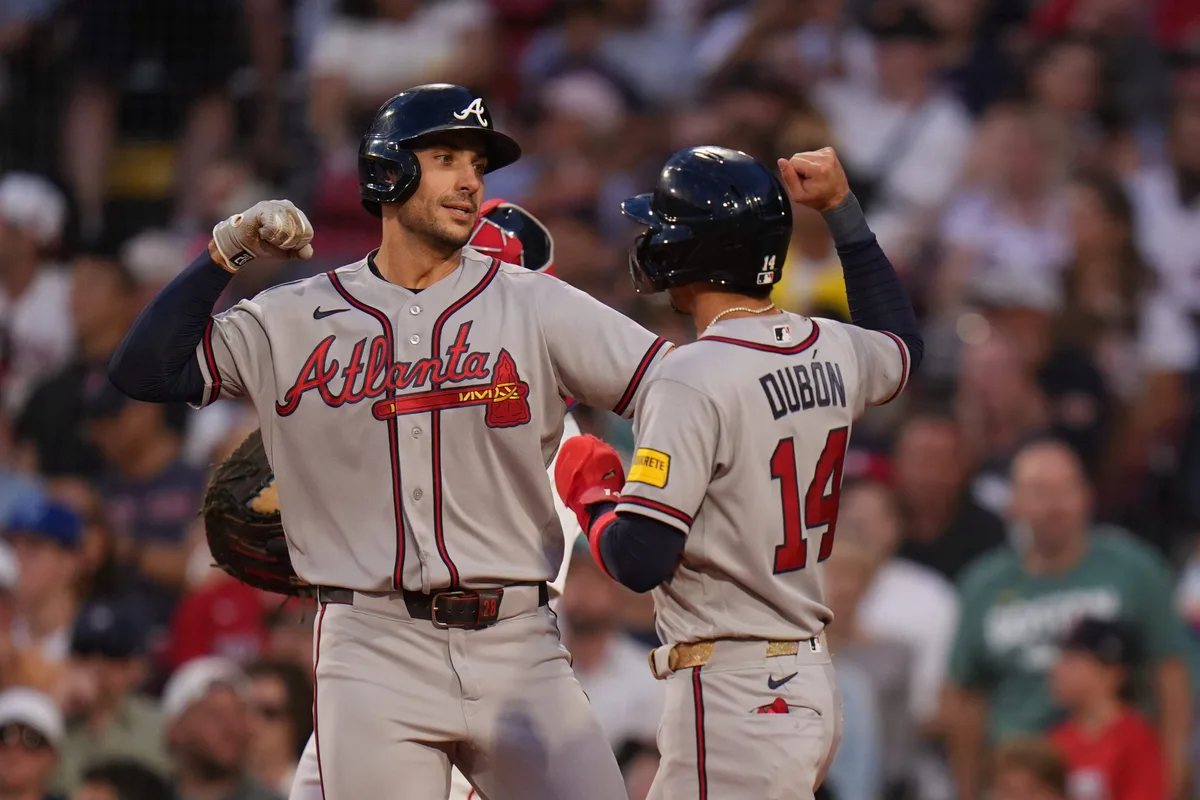 May 26, 2026; Boston, Massachusetts, USA; Atlanta Braves first baseman Matt Olson (28) is congratulated after hitting a two run home run against the Boston Red Sox in the fifth inning at Fenway Park. Mandatory Credit: David Butler II-Imagn Images