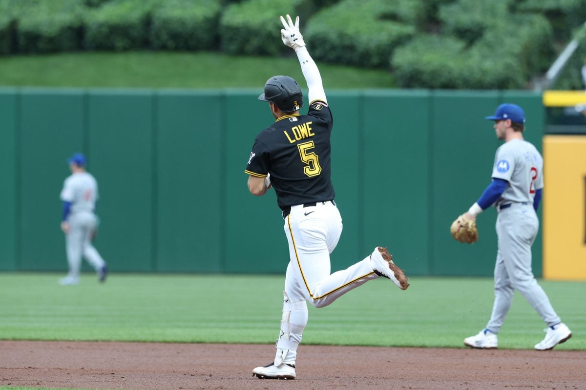 May 27, 2026; Pittsburgh, Pennsylvania, USA; Pittsburgh Pirates second baseman Brandon Lowe (5) gestures as he circles the bases on a three-run home run against the Chicago Cubs during the third inning at PNC Park. Mandatory Credit: Charles LeClaire-Imagn Images