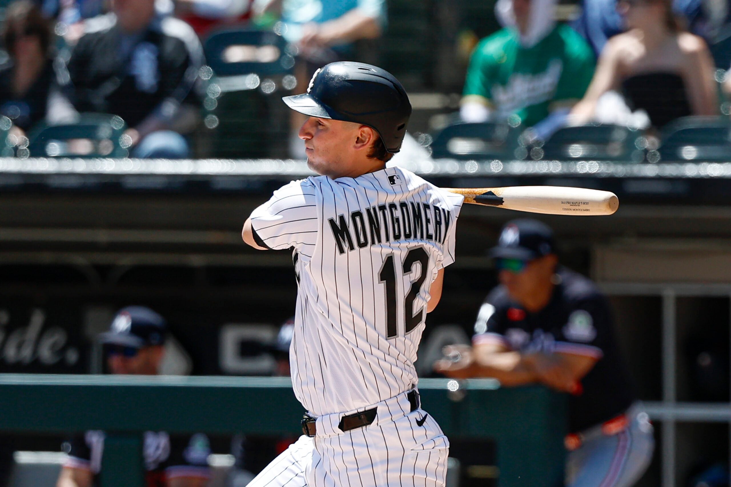 May 28, 2026; Chicago, Illinois, USA; Chicago White Sox shortstop Colson Montgomery (12) hits an RBI-single against the Minnesota Twins during the first inning at Rate Field. Mandatory Credit: Kamil Krzaczynski-Imagn Images