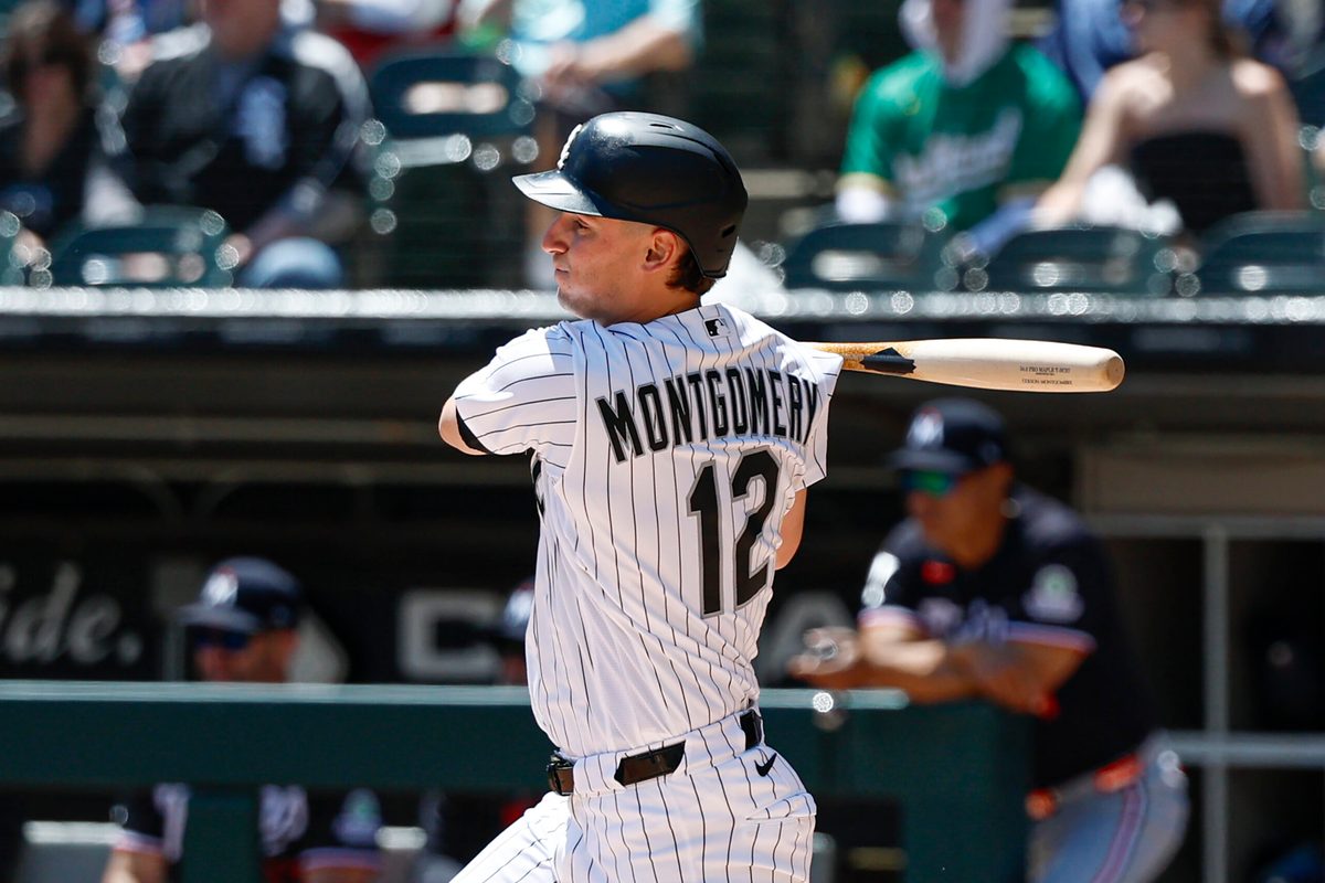 May 28, 2026; Chicago, Illinois, USA; Chicago White Sox shortstop Colson Montgomery (12) hits an RBI-single against the Minnesota Twins during the first inning at Rate Field. Mandatory Credit: Kamil Krzaczynski-Imagn Images