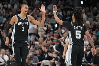 May 28, 2026; San Antonio, Texas, USA; San Antonio Spurs forward Victor Wembanyama (1) reacts with guard Stephon Castle (5) in the second half during game six of the western conference finals for the 2026 NBA playoffs at Frost Bank Center. Mandatory Credit: Daniel Dunn-Imagn Images