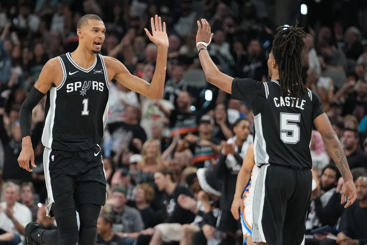 May 28, 2026; San Antonio, Texas, USA; San Antonio Spurs forward Victor Wembanyama (1) reacts with guard Stephon Castle (5) in the second half during game six of the western conference finals for the 2026 NBA playoffs at Frost Bank Center. Mandatory Credit: Daniel Dunn-Imagn Images