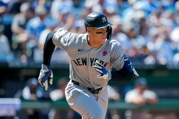 May 25, 2026; Kansas City, Missouri, USA; New York Yankees right fielder Aaron Judge (99) runs to first base during the third inning against the Kansas City Royals at Kauffman Stadium. Mandatory Credit: Jay Biggerstaff-Imagn Images