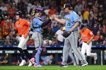 May 29, 2026; Houston, Texas, USA; Milwaukee Brewers catcher William Contreras (24) and pitcher Trevor Megill (29) celebrate after the game against the Houston Astros at Daikin Park. Mandatory Credit: Troy Taormina-Imagn Images