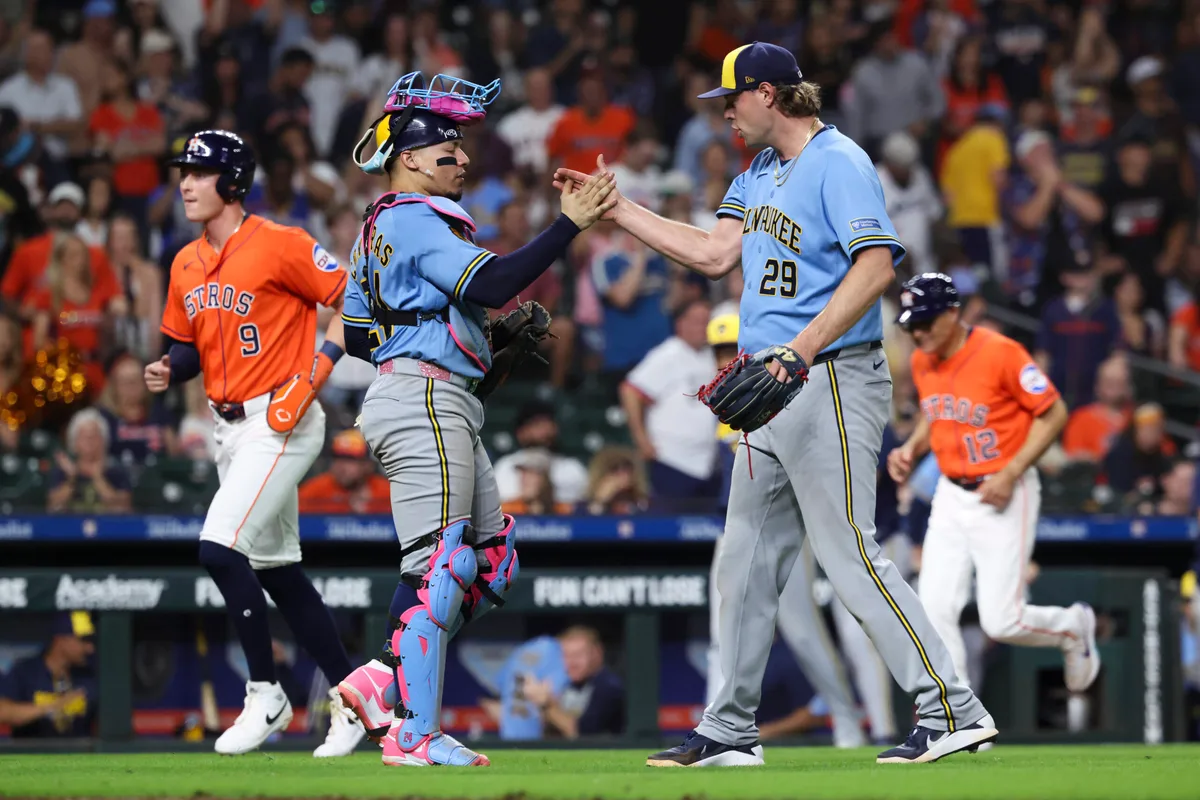 May 29, 2026; Houston, Texas, USA; Milwaukee Brewers catcher William Contreras (24) and pitcher Trevor Megill (29) celebrate after the game against the Houston Astros at Daikin Park. Mandatory Credit: Troy Taormina-Imagn Images